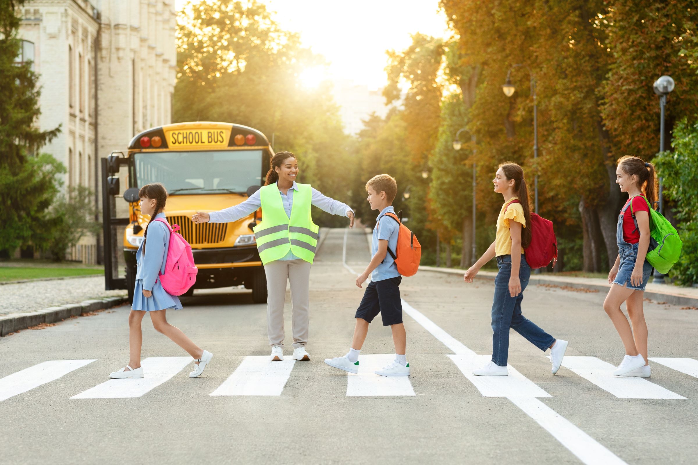 kids crossing street school bus resize