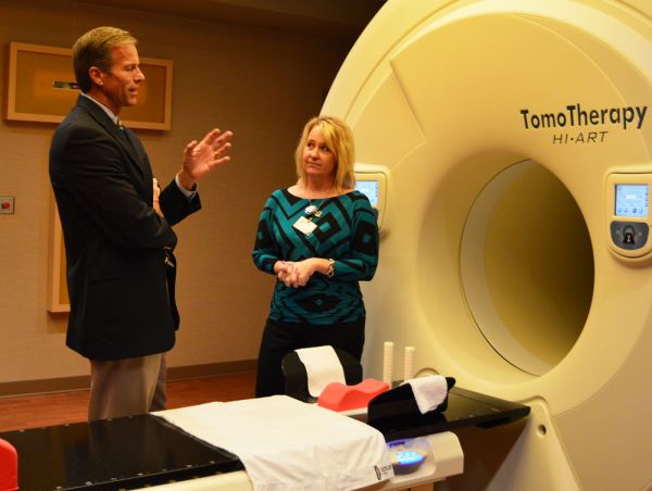 Senator John Thune speaks with Lori Kasuske, Cancer Center Dosimetrist, about Prairie Lakes Healthcare System’s radiation oncology services.