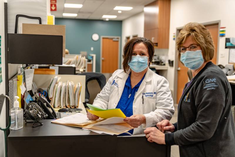 Dr. Melanson behind the scenes of the Nephrology Clinic.